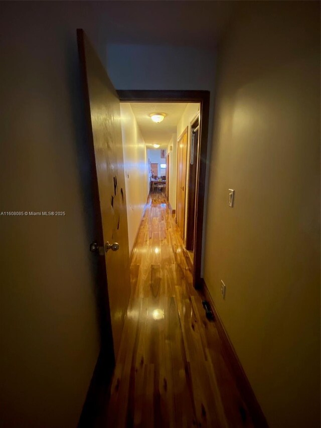 hall featuring hardwood / wood-style floors