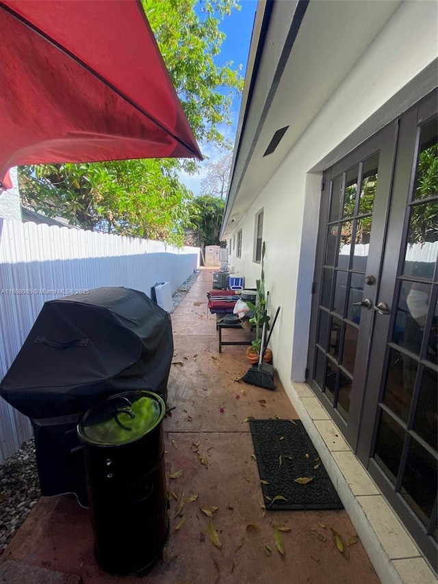 view of patio with french doors and area for grilling