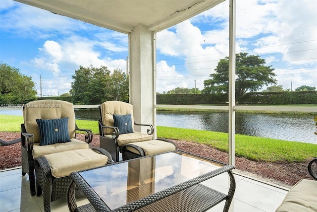 sunroom with a water view