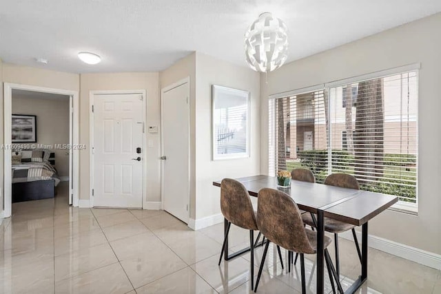 dining room with light tile patterned floors