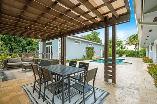 view of patio with a pergola and an outdoor living space