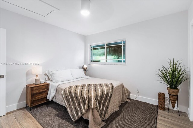 bedroom featuring wood-type flooring