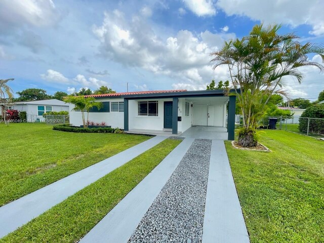 single story home with a front yard