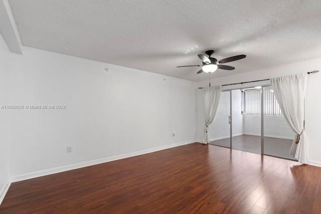 unfurnished bedroom with ceiling fan, a textured ceiling, a closet, and dark wood-type flooring