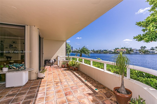 balcony featuring a water view