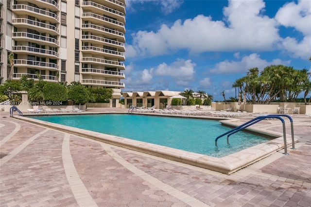 view of swimming pool featuring a patio