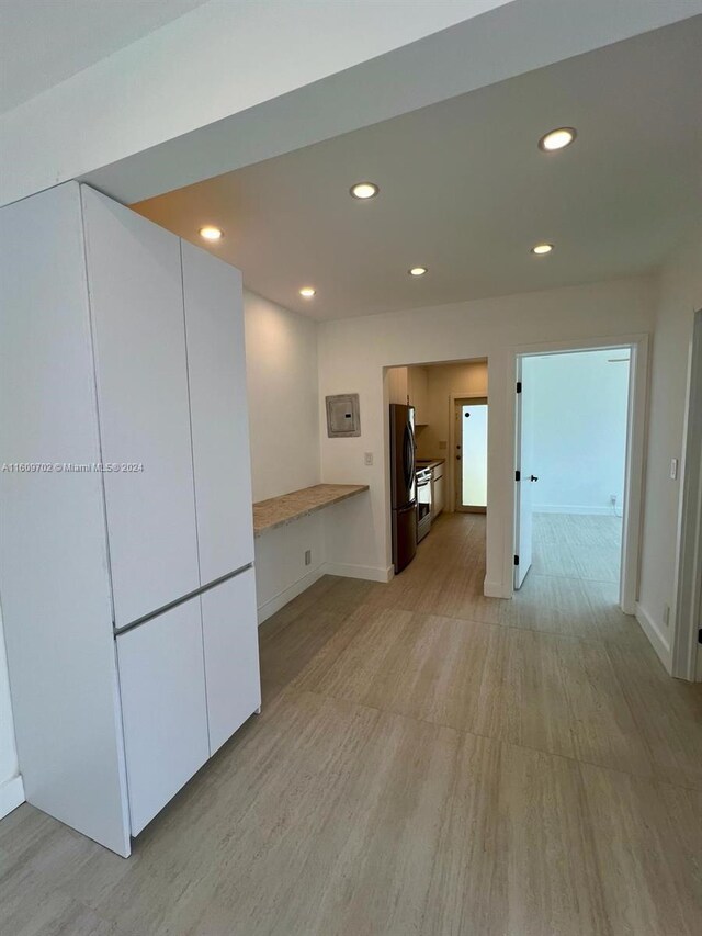 hall featuring light wood-type flooring