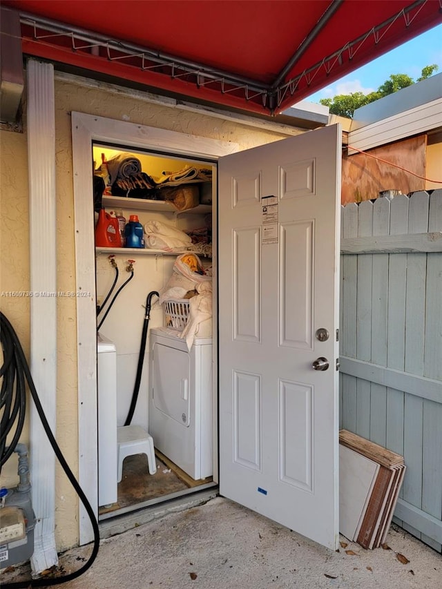 exterior space featuring separate washer and dryer