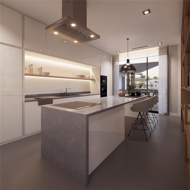 kitchen with a center island, white cabinetry, hanging light fixtures, black electric stovetop, and island exhaust hood