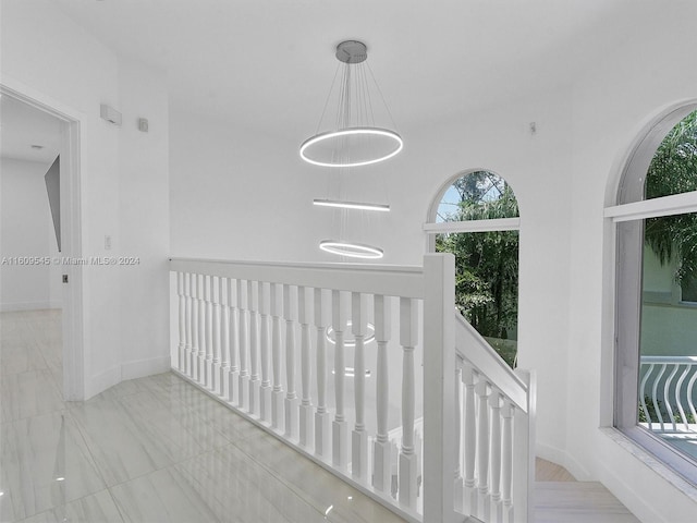 hallway with light tile flooring