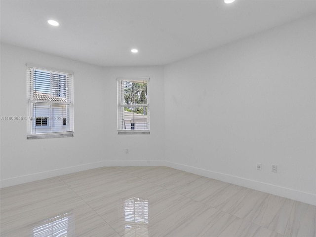 view of tiled spare room