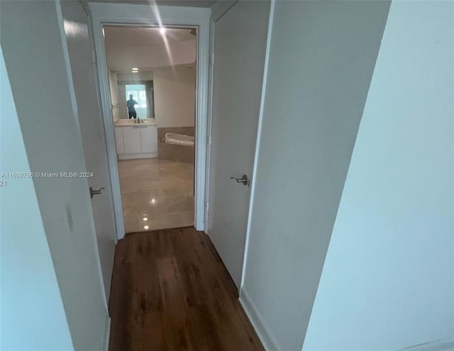 hall featuring hardwood / wood-style floors