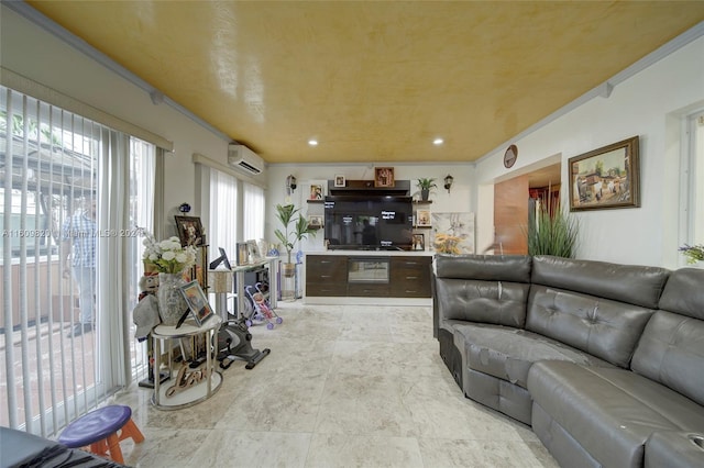 living room featuring ornamental molding, light tile flooring, and a wall mounted AC