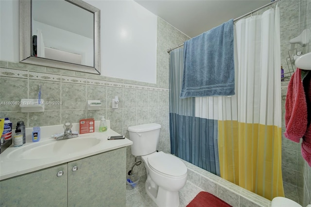 bathroom featuring tile flooring, tile walls, backsplash, toilet, and vanity