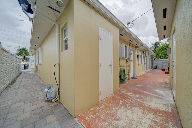 view of side of home featuring a patio area