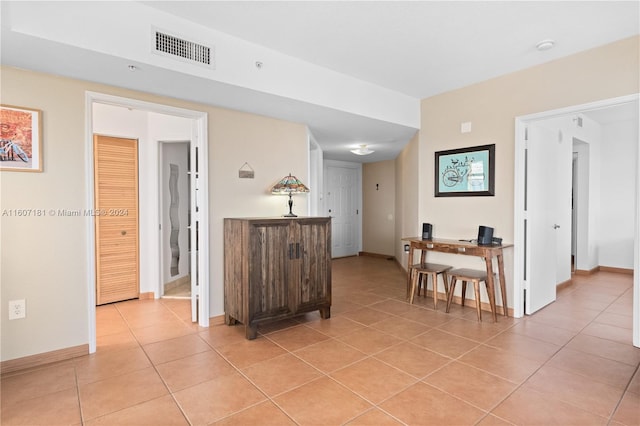 interior space featuring light tile patterned flooring