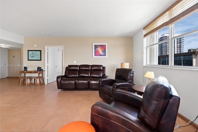 living room with light tile patterned floors