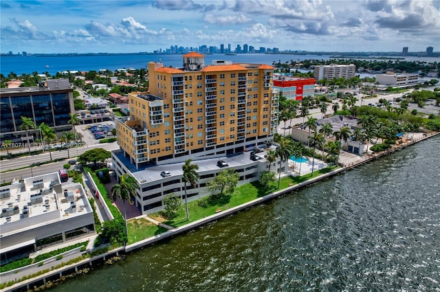 birds eye view of property featuring a water view