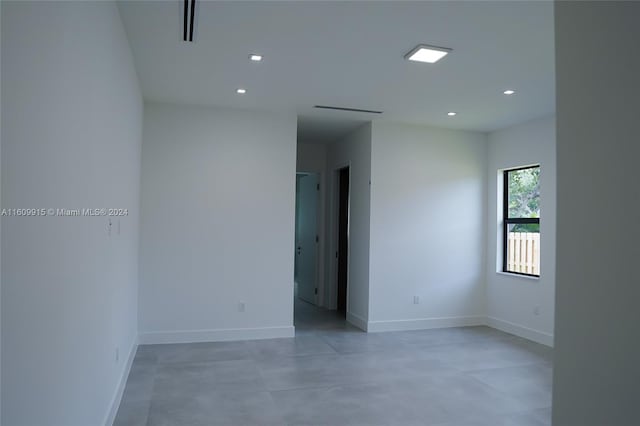 spare room featuring concrete floors