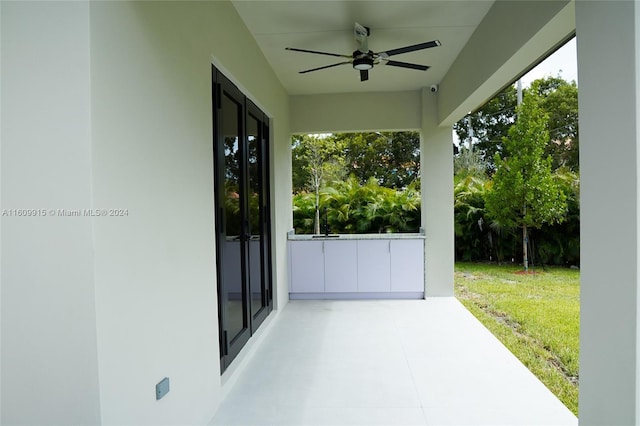 view of patio / terrace with ceiling fan