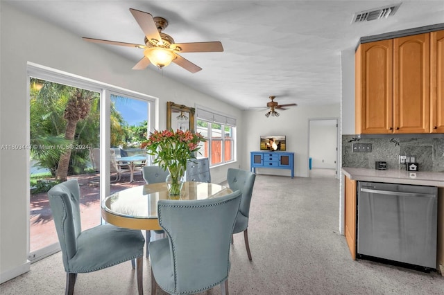 dining space with ceiling fan