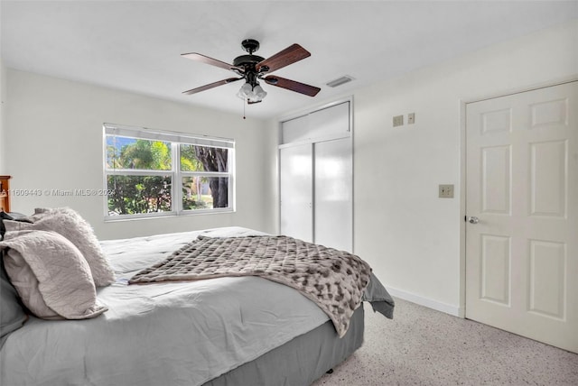 bedroom with a closet and ceiling fan