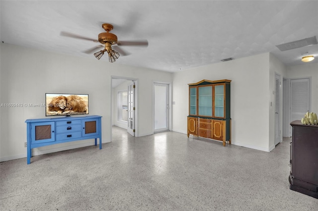 living room with ceiling fan