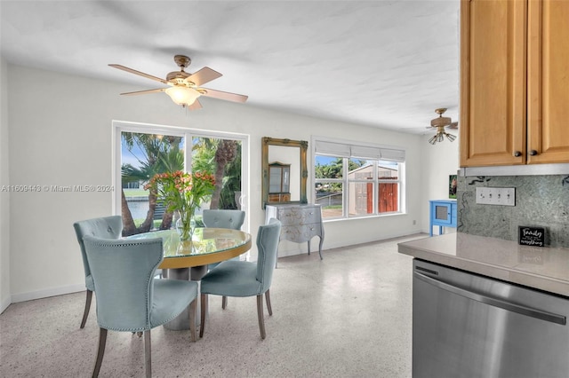 dining space featuring ceiling fan