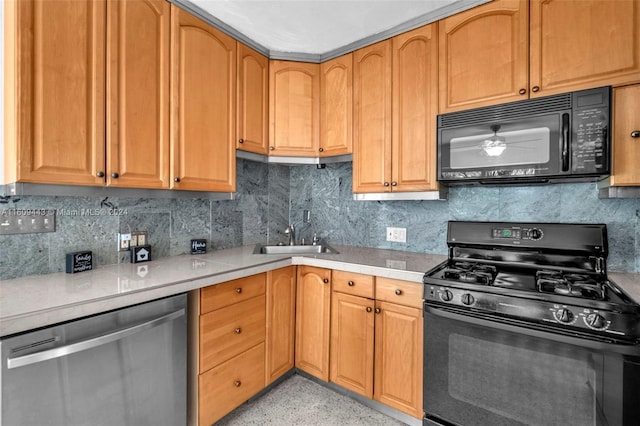 kitchen with backsplash, sink, and black appliances