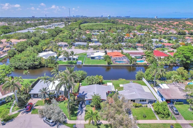 birds eye view of property featuring a water view