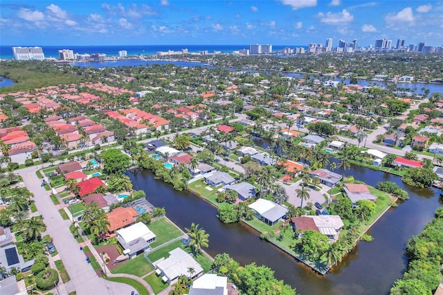 birds eye view of property featuring a water view