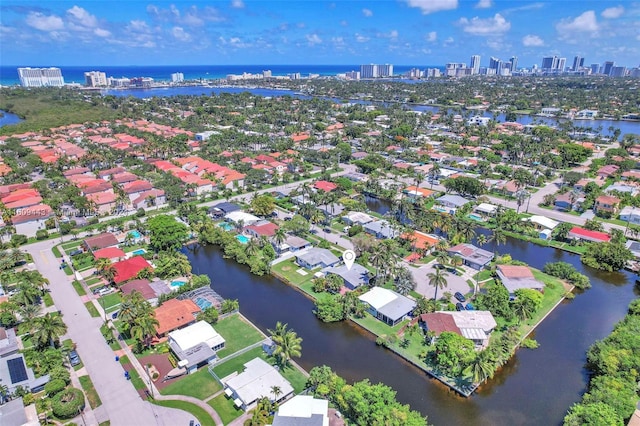 drone / aerial view with a water view