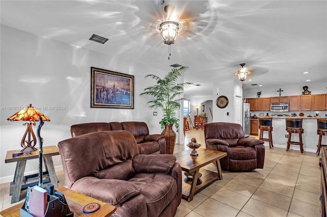 674 SE 33rd Ter, Homestead, FL 33033 - living room featuring light tile patterned floors