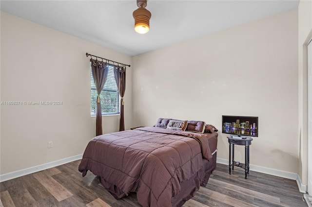 bedroom featuring wood-type flooring