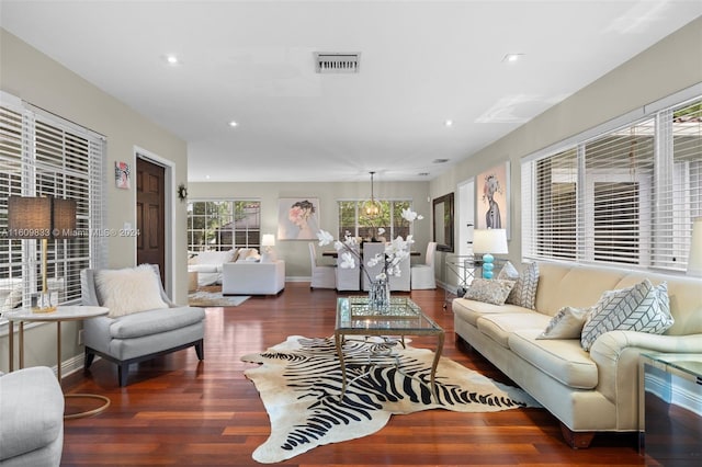 living room featuring dark wood-type flooring