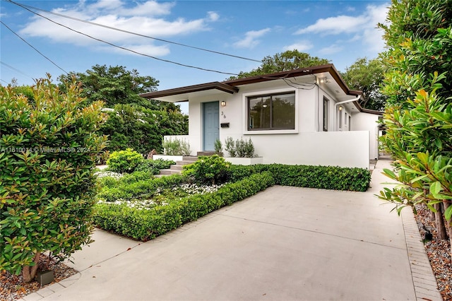 view of front of home with a patio area