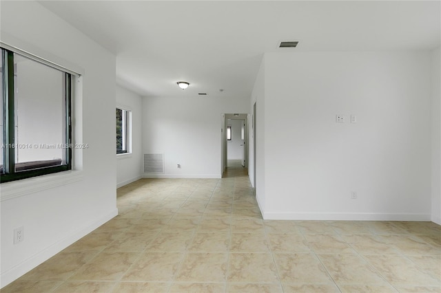 view of tiled spare room