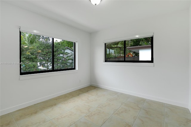 view of tiled empty room