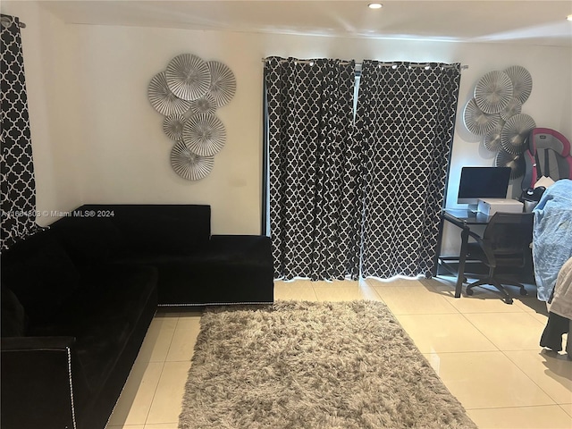 living room featuring light tile patterned flooring