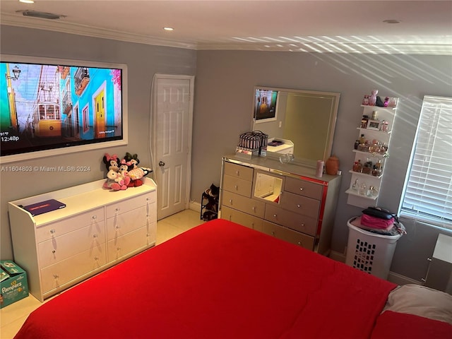 bedroom featuring crown molding