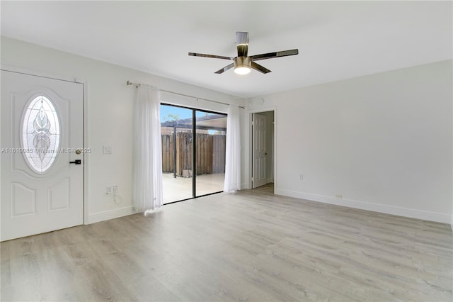 foyer with ceiling fan, light hardwood / wood-style flooring, and plenty of natural light