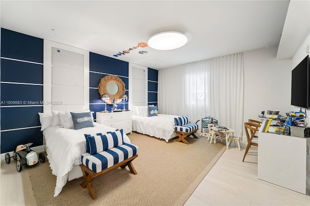 bedroom featuring light hardwood / wood-style flooring