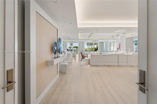 corridor featuring light hardwood / wood-style floors