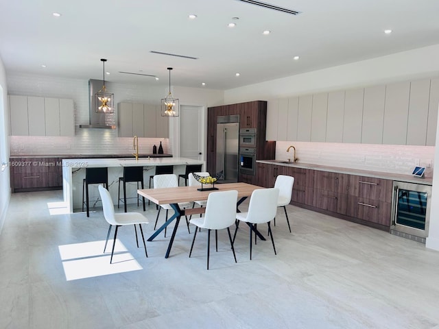12231 SW 2nd St, Plantation, FL 33325 - dining room with wine cooler and recessed lighting