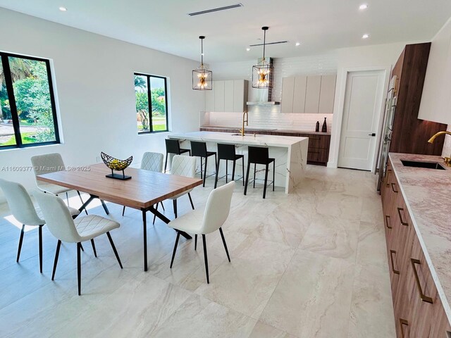 12231 SW 2nd St, Plantation, FL 33325 - dining space featuring recessed lighting and light marble finish flooring