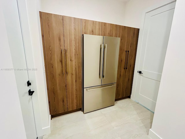 12231 SW 2nd St, Plantation, FL 33325 - kitchen with freestanding refrigerator and brown cabinetry