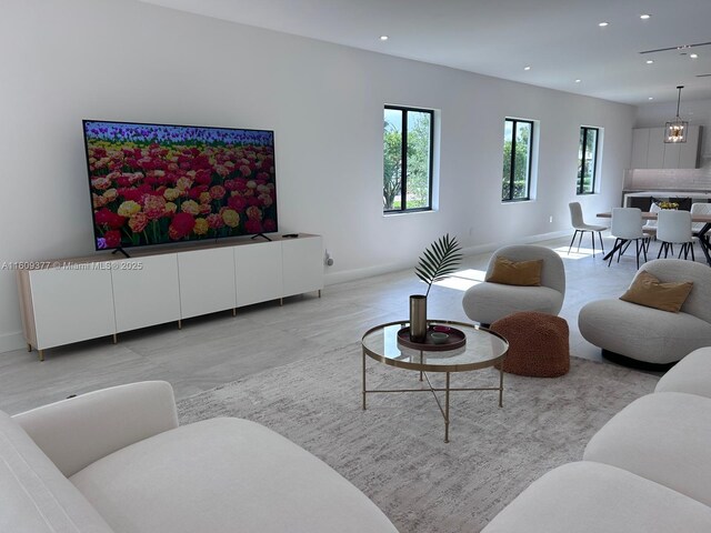 12231 SW 2nd St, Plantation, FL 33325 - living area featuring baseboards and recessed lighting