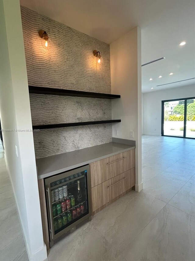 12231 SW 2nd St, Plantation, FL 33325 - indoor dry bar with beverage cooler, baseboards, and recessed lighting