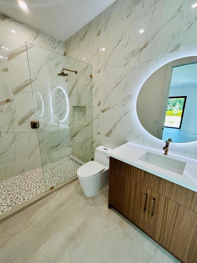 12231 SW 2nd St, Plantation, FL 33325 - bathroom with marble look tiles, a marble finish shower, toilet, vanity, and tile walls