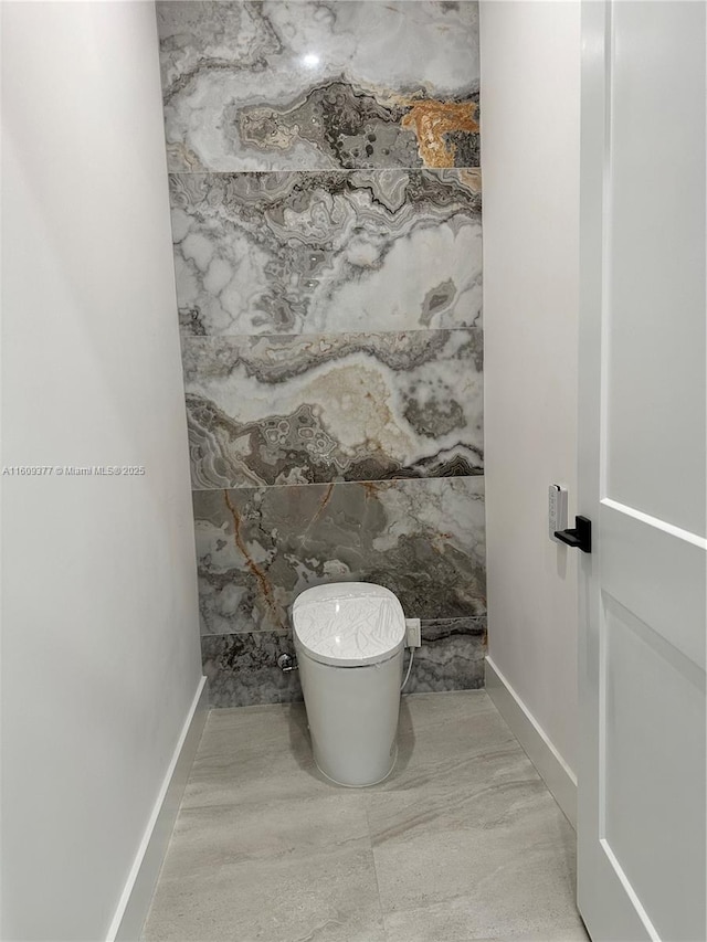 12231 SW 2nd St, Plantation, FL 33325 - bathroom featuring toilet and baseboards